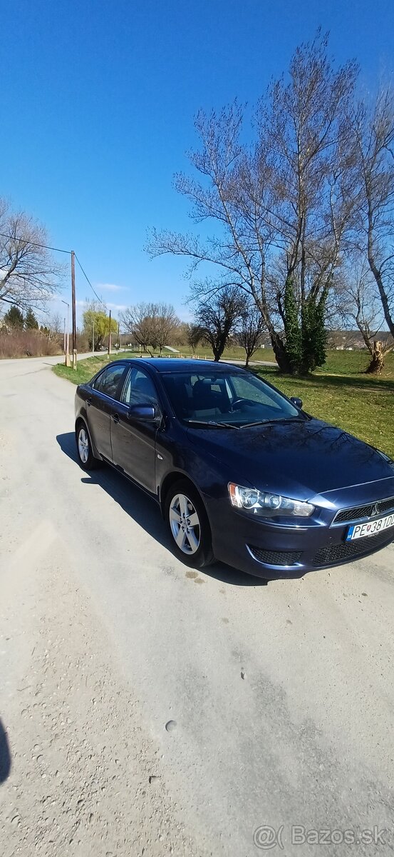 Mitsubishi Lancer 1,5 - 5