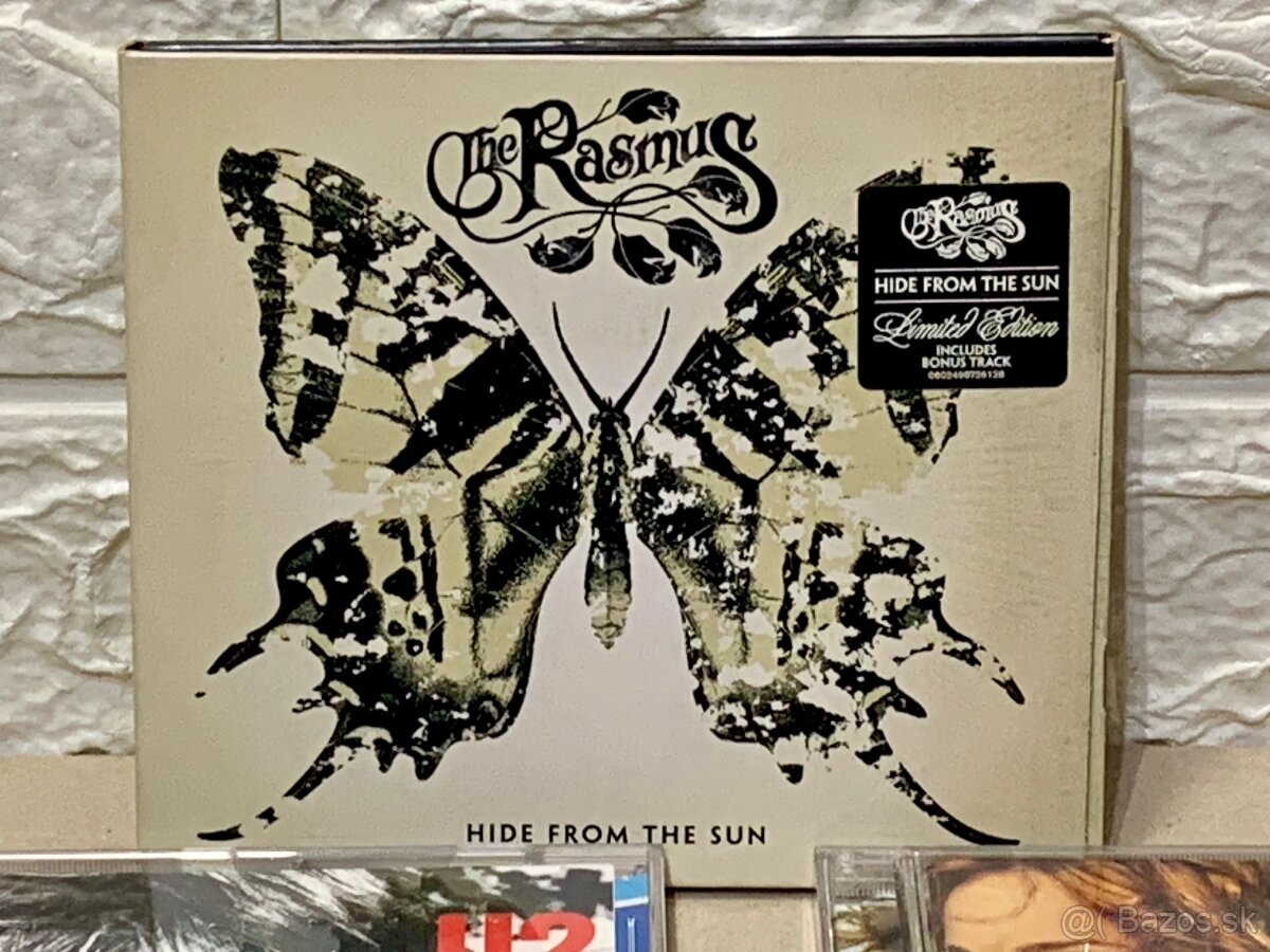 CD-čka; Eric Clapton. Madonna. U2. Elvis. CHER. The Rasmus. - 5