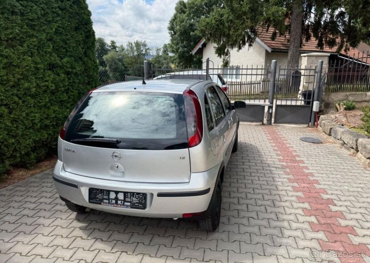 Opel Corsa 1,2 i klima , 2 sady kol benzín manuál 55 kw - 5