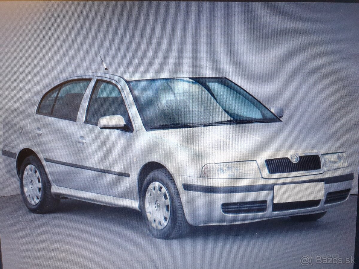 Škoda Octavia 1 predná kapota,strieborná 9102 - 5