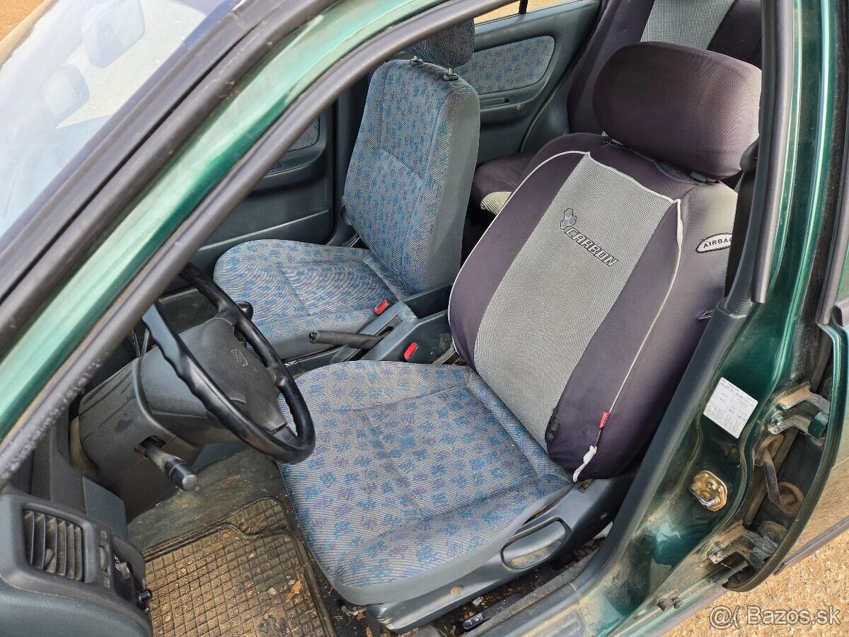 Nissan Almera 1.4 - 5