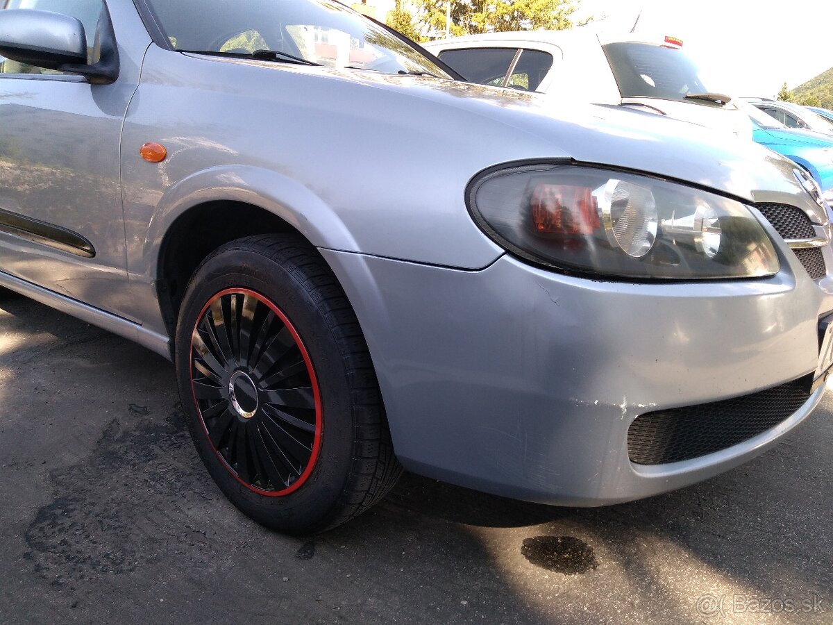 Nissan almera N16 Ročnik 2006 - 5