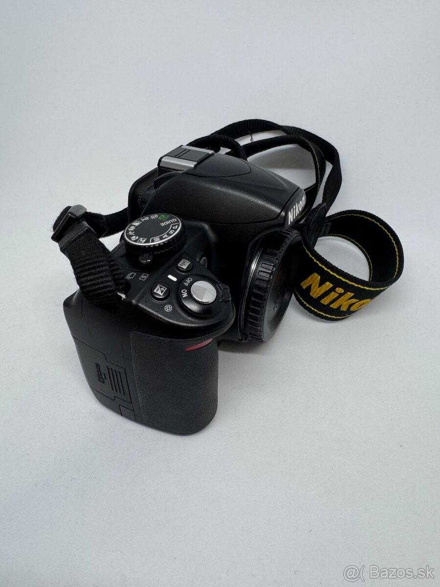 Nikon D3100 + NIKKOR 18-105 - 5