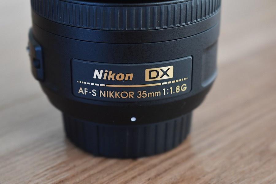Nikkor 35 mm AF-s 1,8G nikon - clona krytky vrecko + filter - 5