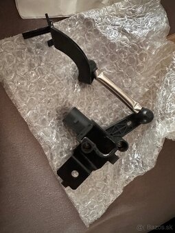 Snimac xenonu novy diel passat b7, skoda puklice, pas - 5