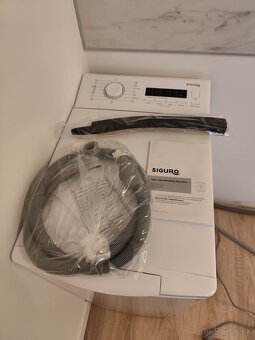 Nikdy nepouzita uzka zvrchu plnena pracka Siguro WM C237TW, - 5