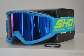 prilba okuliare modrá žltá fluo shot freegun ECE 22.06. - 5