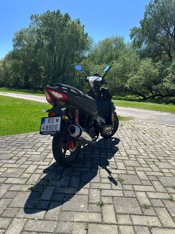 Maxon 125ccm s papiermi - 5