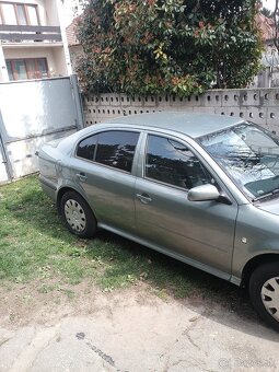 Octavia 1.6 benz 75kw - 5