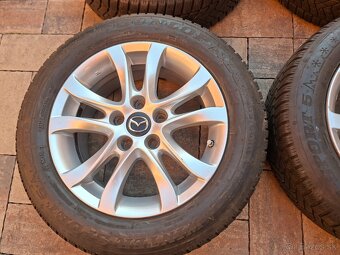 hlinikové disky org.Mazda 3---R16 - 5
