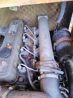 Nakladac čelný  smykovy nakladac - 5