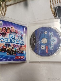 Hry na PS3 GTA5, Fight night champions, F1 Race stars - 5