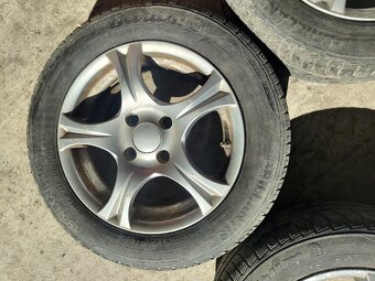 Hliníkové disky 4x100 R14 - 5