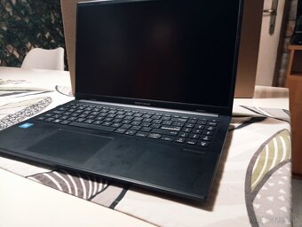 Asus vivobook e1504g - 5