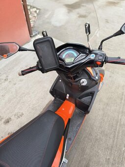 Adamoto 125 - 5