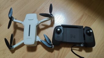 Fimi x8 mini v2 dolet 9km, doba letu 37min, 4k video - 5