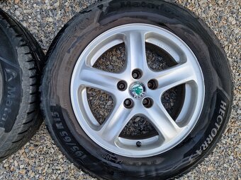 Octavia 5x100 R15 Komplet 180e - 5