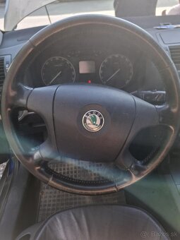 Skoda octavia 2 1.9 tdi 77 kw - 5