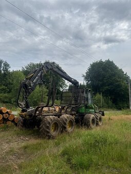 John Deere 810D - 5