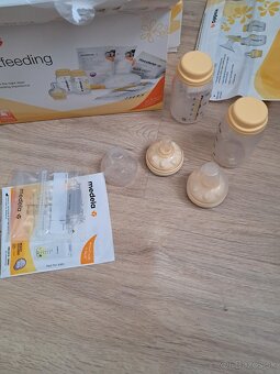 Odsavacka medela swing na 2 prsniky - 5