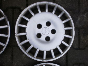 Puklice Saab Opel 5x110 R15 4ks - 5