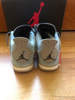 Nike Air Jordan 4 UNC - 5