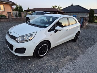 Kia rio - 5