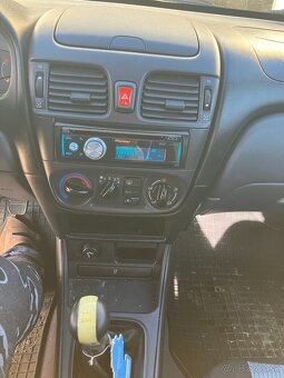 Nissan Almera N16 sedan, 1,5 benzín 72 kW - 5