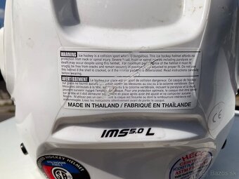 Predám hokejovú prilbu Bauer IMS 5.0 s mriežkou veľkosťL - 5
