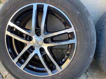 5x100 ,205/60 R16 Letné gumy ,zn. Dezent, boli na Seat Arona - 5