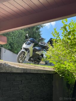 Aprilia sportcity 125/200 - 5