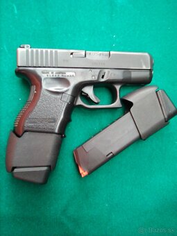 Dva 19 ranové zásobníky s návlekom určené pre Glock26 - 5