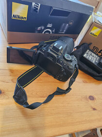 Nikon D5100 + 18-55 AF-S DX VR - 5
