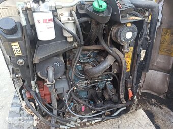 Minibager Bobcat 323 - 5