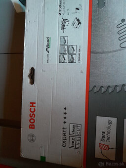 Stolna píla Bosch GTS 10 XC a pojazdny stol k pile GTA 60W - 5
