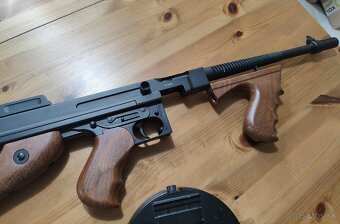 Airsoft Thompson M1928A1 (CYMA CM.051) + výkonná batéria
- 5