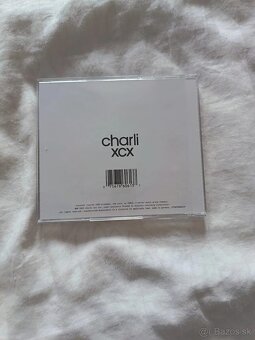 brat and it's the same but there's three more songs... - 5