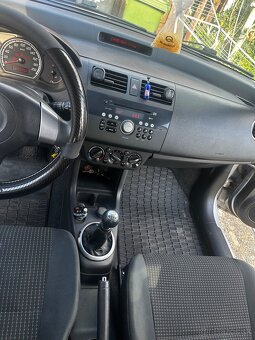 Suzuki 1.3 benzin 67.5 kw - 5