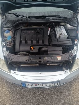 Škoda Octavia 2009 77kw 290 tis km - 5