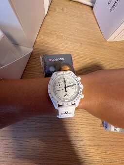 Swatch omega - 5