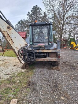 Predam traktorbager TEREX. - 5