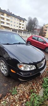 Nissan -Maxima QX - 5