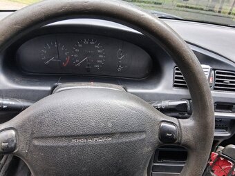 Mazda 323 - 5