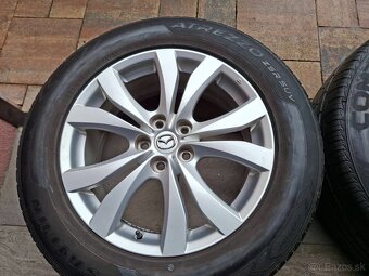 Orig.hliníkové disky Mazda R18, 5x114,3 - 5