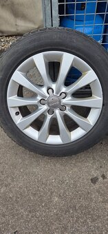 Predám zimný komplet na audi. - 5
