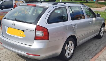 ŠKODA OCTAVIA 1.6(75kw) SLEVA(zadní dveře v elekt - 5
