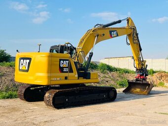 Pásový bager Caterpillar 323 - 5