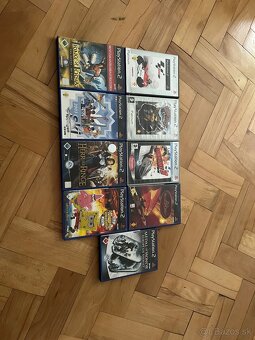 Playstation 2 s boxom + 2x Dualshock + 9x hra - 5