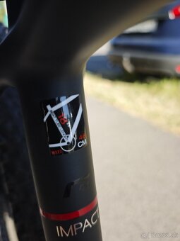 Genesis impact 8.2 carbon - 5
