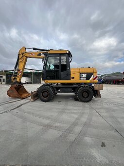 Kolesový bager/rýpadlo  Caterpillar M316D - 5